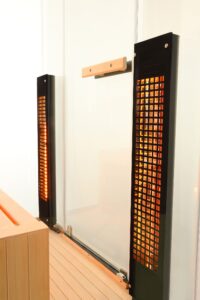 sauna moderna ed elegante ad infrarossi con vetrata su 3 lati radiatori full spectrum - vista radiatori